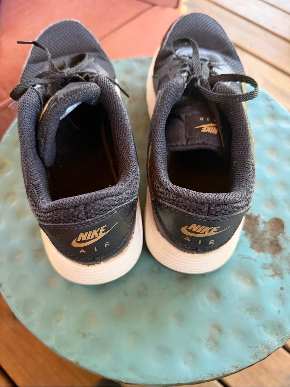Nike Black Sneakers with Gold Logo and Leopard Accent